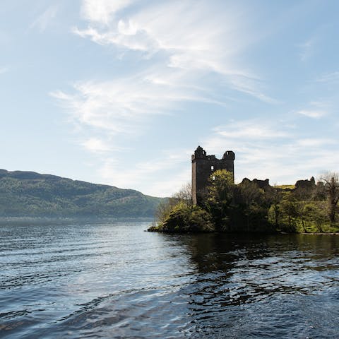 Visit Urquhart Castle on the banks of Loch Ness, just a thirty-minute walk away