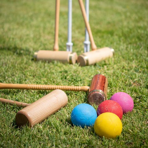 Get competitive with a game of croquet in the garden