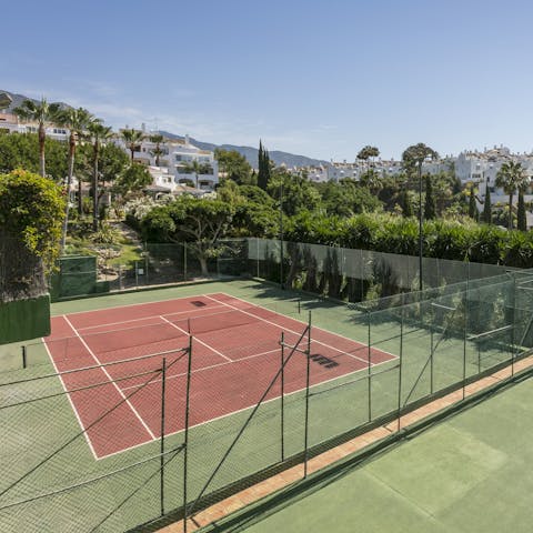 Make use of your private resort's facilities and challenge your group to a game of doubles tennis