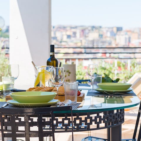 Dine with a view of the sprawling city before you