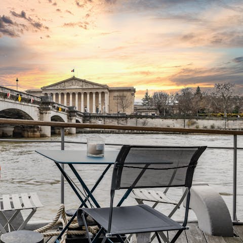 Sip cocktails on the Seine as the sun starts to set