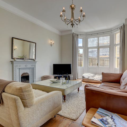 Snuggle up together on an evening with a bottle of wine on plush, sinkable sofas
