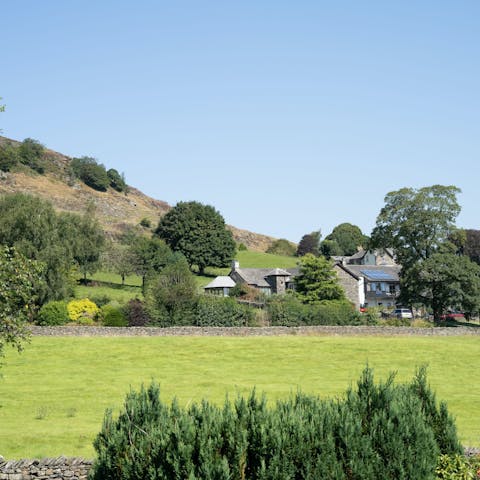 Enjoy views of Kentmere and the River Kent from this charming home