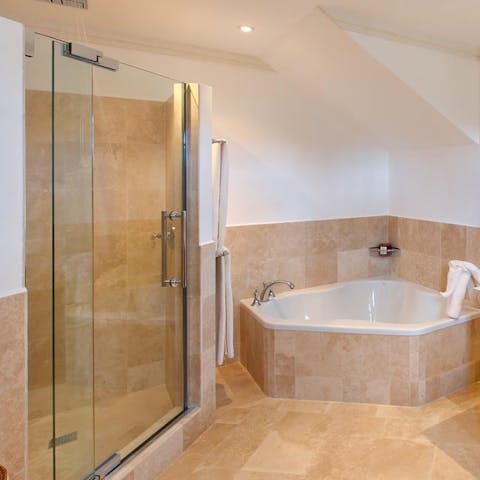 Unwind in one of the bathtubs or luxurious showers after a long day of exploring and pampering