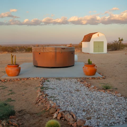 Take a sunset soak with an endless desert view in the hot tub
