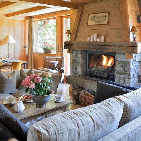 As it gets chilly, huddle around this rustic fireplace