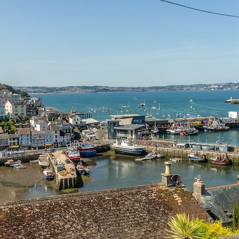Experience quintessential coastal charm from the lively fishing port of Brixham