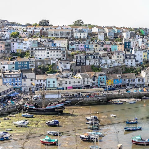 Step outside and follow the views down to the bustling harbour 