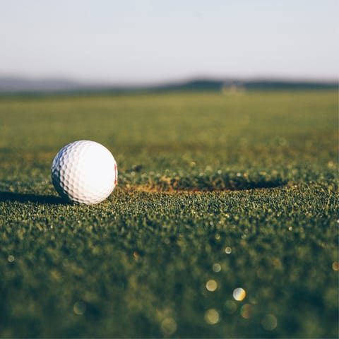 Play a round at Capdepera golf course, 9km away