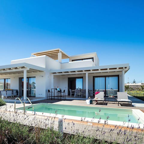 Catch some sun by the private pool and escape the Sicilian sunshine