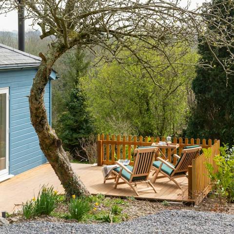 Relax out on the decking overlooking the rolling Devon hills