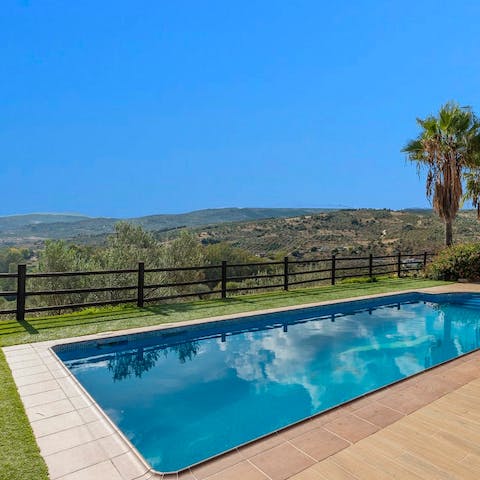 Gaze at the Andalucian coutryside as you float in the swimming pool