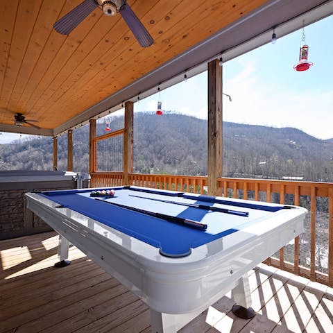 Get up close and personal with Mount LeConte over a game of pool