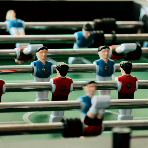 Keep little ones busy with a round or two of foosball – winner takes all