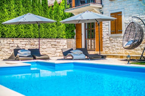 Chill out with a float in the private pool, or relax with a good book on a lounger
