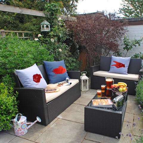 Enjoy long summer afternoons reclining on the rattan furniture with a Pimms in hand