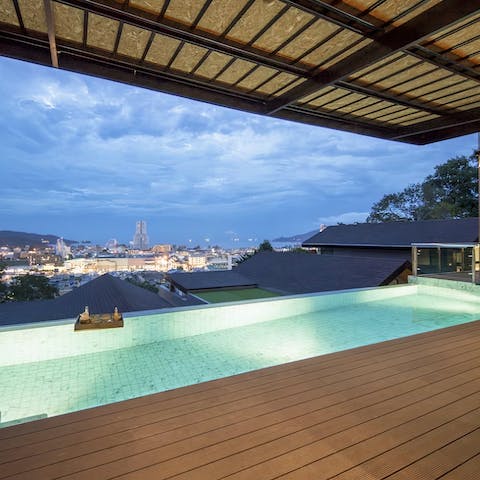 Gaze out at the breathtaking views of Thailand from the private terrace and infinity pool