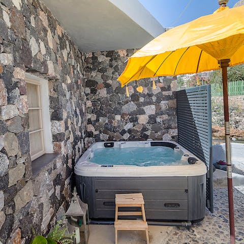 Sit back and relax in one of the two Jacuzzis in the garden