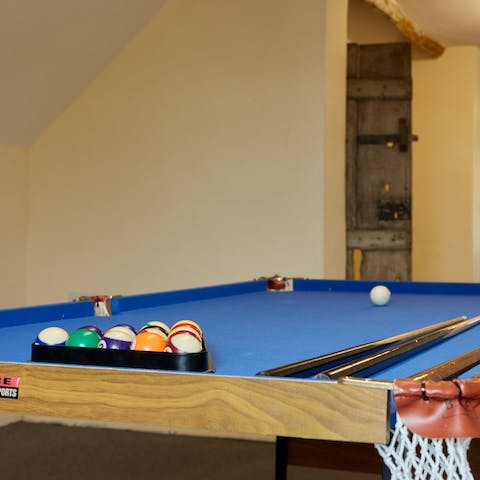 Head up to your games room for a few games of pool while sipping on a cocktail