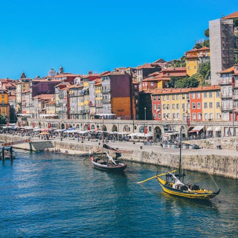 Explore bustling Cais da Ribeira, a twelve-minute walk away