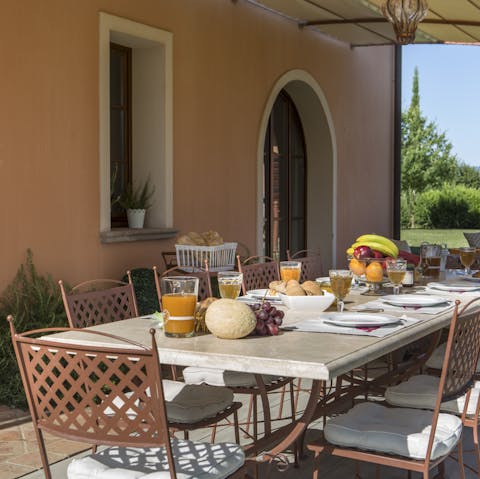 Alfresco aperitivo with a glass of local wine on the terrace