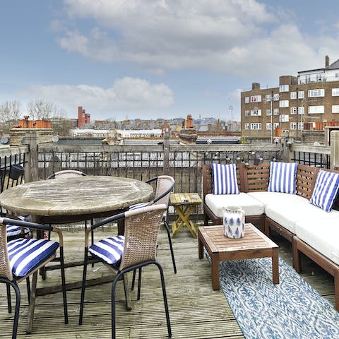 Sit down to an alfresco meal on the rooftop terrace while enjoying views over Baron's Court