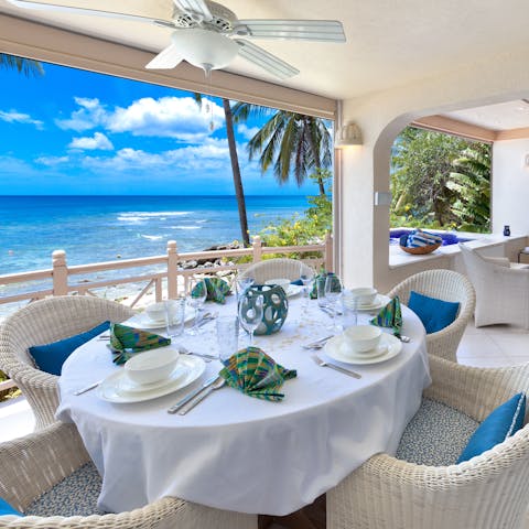 Dine with a sea view on the covered terrace