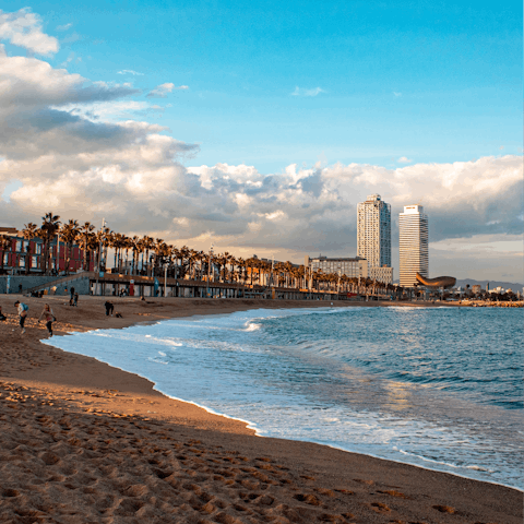 Stroll down to Barceloneta beach for a day by the sea