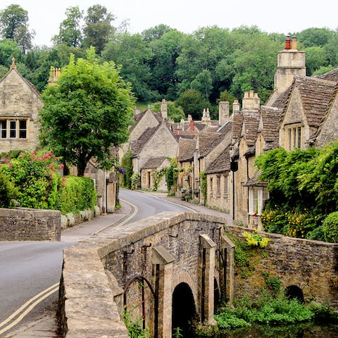 Explore the quaint villages and rolling hills of the Cotswolds