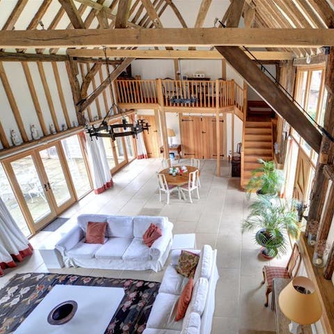 Fall in love with the wooden beams, thatched roof and magnificent living space