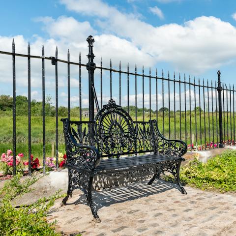 Feel the morning sun on your face and catch up on your book on the bench