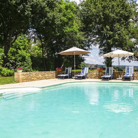 Laze by the heated pool under the parasols, or swim a few lengths