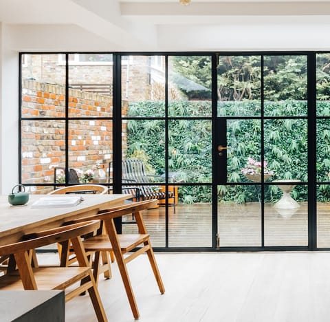 Throw open the chic French doors on warm days and let a cooling breeze into the kitchen