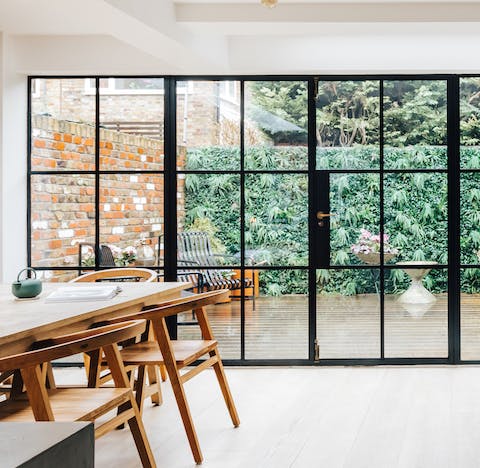 Throw open the chic French doors on warm days and let a cooling breeze into the kitchen