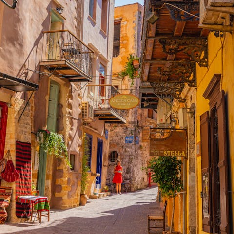 Wander through the narrow streets of Chania, a short drive along the coast