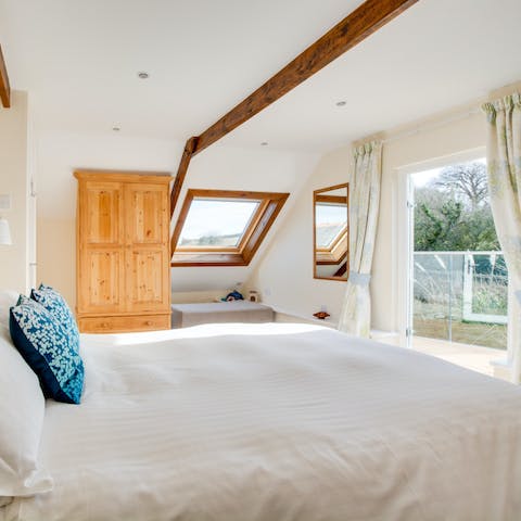 Open the balcony doors and savour refreshing views across the countryside