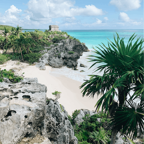 Paddle in the clear shallows at Tulum Beach – it's a nine-minute drive
