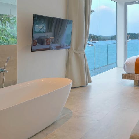 Soak in the bathtub in utter serenity amid the ocean blue views