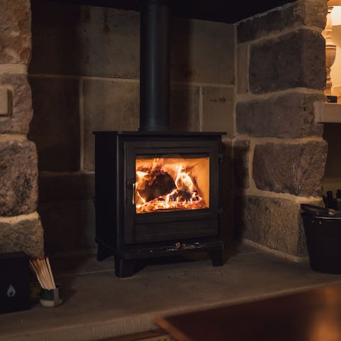 Curl up by the wood-burner with a board game and a glass of wine