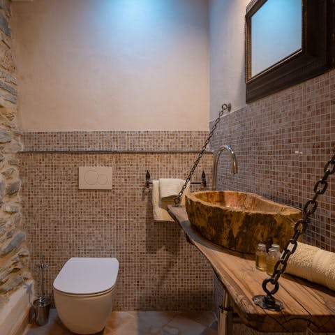 Freshen up in spa-like bathrooms with rustic touches