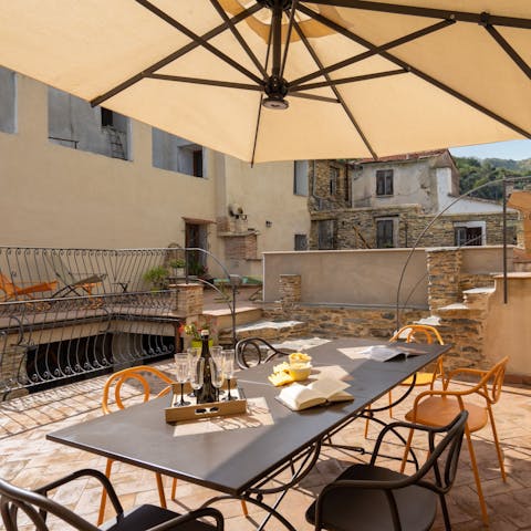 Nibble sun-drenched snacks on the terrace 