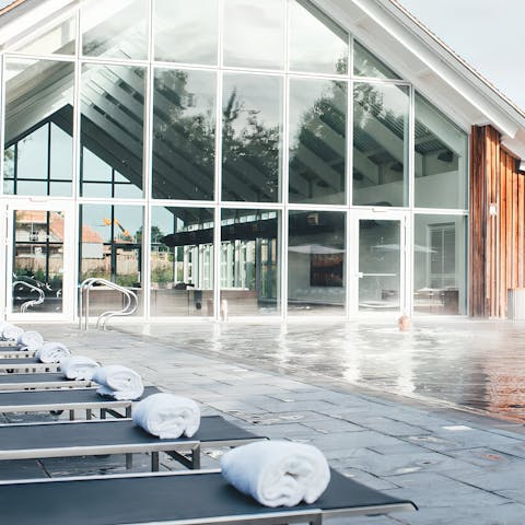 Relax at the spa centre featuring swimming pools, a sauna and a gym