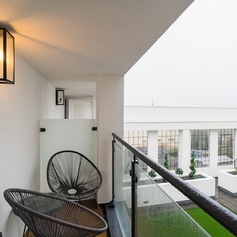 Sip your morning cup of coffee on the balcony overlooking the courtyard