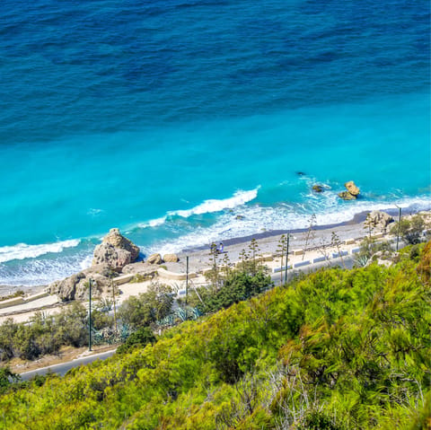 Visit the warm sandy shores of Ialyssos, a short drive away