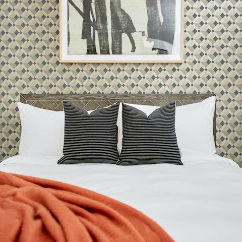 Wake up in the stylish bedroom feeling rested and ready for another day of exploring