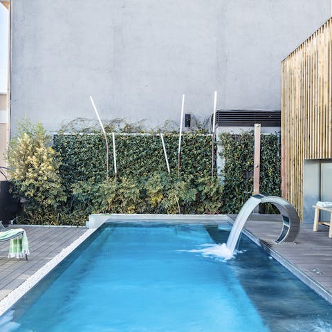 Take cool dips in the shared terrace's inviting pool