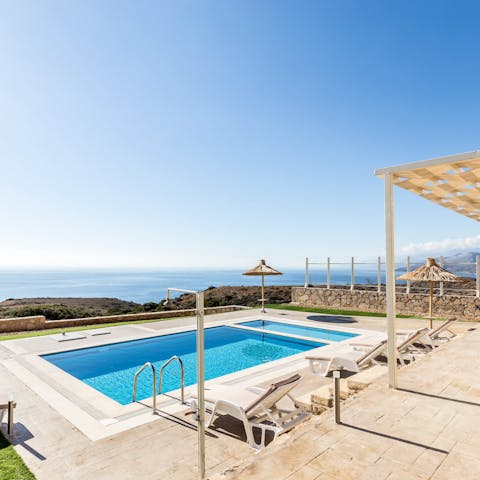 Take a dip in the pool and admire the ocean views