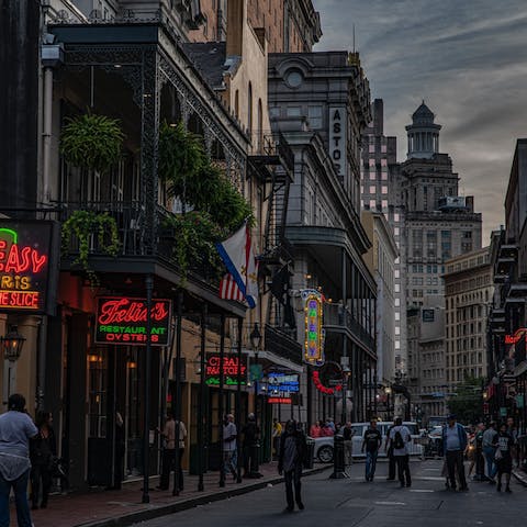 Explore Bourbon Street's jazz bars and restuarants, just a 10-minute walk away