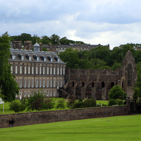 Take a twelve-minute stroll to Holyrood Abbey and Palace