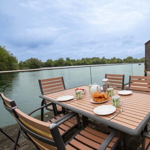 Soak up the lakeside views from the deck, perfect for alfresco meals
